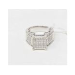 A 14ct white gold and diamond pavé set ring, approx. ring size N Report by NG Approx. 9.4 g (all in)