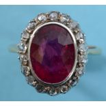 An 18ct gold, ruby and diamond cluster ring, approx. ring size M½ See illustration Approx. 5.3 g (