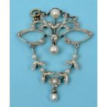 An Edwardian pearl and diamond pendant, set in white and yellow coloured metal See front cover