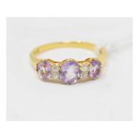 An 18ct gold, amethyst and diamond ring, approx. ring size L Approx. 2.6 g (all in)