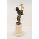 A bronze and ormolu figure, in the form of a man carrying a drum behind his back, on a marble