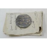 A lead Papal Bulla (a lead seal attached to a Papal edict), Pope Boniface IX, with an old letter and