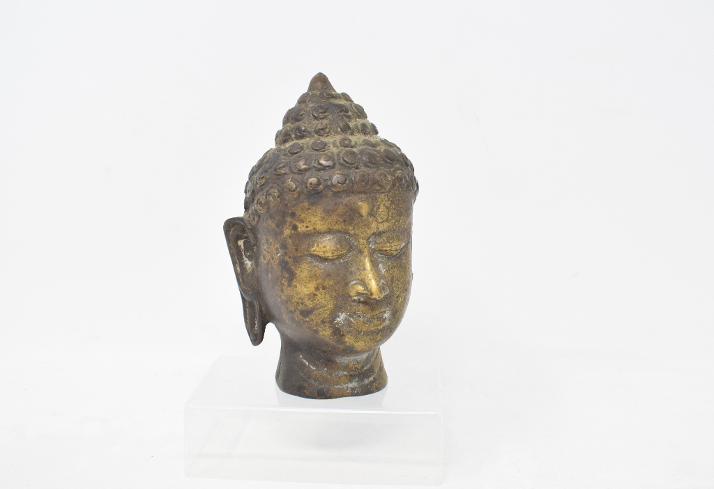 A bronze Buddha head, 13 cm high