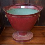 A painted toleware bucket, of oval form, with a swing handle, 45 cm high