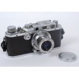 A Leica IIIa camera, with 5 cm 1:3.5 lens, c.1937-38, Nr. 197310, in a leather case, with two