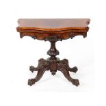 A Victorian burr walnut card table, on a leaf carved column, 90 cm wide See illustration