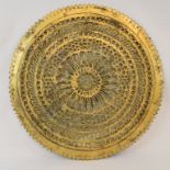 An Indian gilded copper chakra, 31 cm diameter