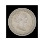 A Robert Cauer carved marble relief portrait of a girl, with her hair plaited, signed R Cauer 1873