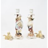 A pair of Continental porcelain candlesticks applied figures, 25.5 cm high, two Royal Doulton
