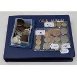 Assorted shillings, and other coins, in an album and loose