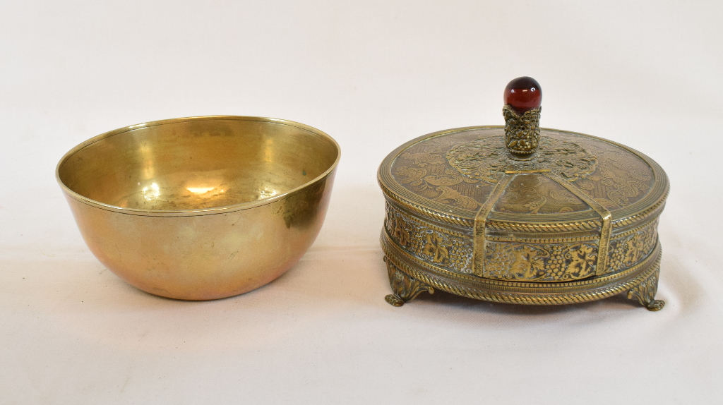 An Indian brass hand warmer, with embossed scroll decoration, 13 cm diameter, and two other items ( - Image 2 of 2
