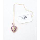 A 9ct gold, ruby and diamond heart shape locket, with a fleur-de-lys motif, on a 9ct gold chain