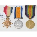 A 1914-15 trio, awarded to 1328 Gnr H Kenneally RFA