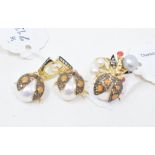 A pair of gold plated ladybird drop earrings, and a matching ring, approx. ring size O½ (2) Report