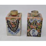 A 19th century tin glazed tea caddy and cover, 10.5 cm high, another similar, a pair of Delft plates