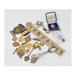 Assorted Primrose League badges, other similar items, a set of eight Egyptian type silver coloured