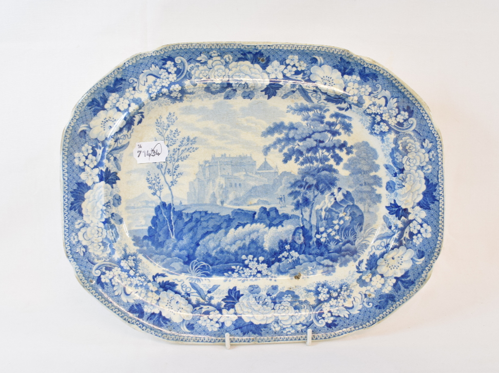 A 19th century blue and white pottery plate, transfer printed Stirling Castle, 34 cm wide, and two