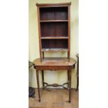 A small inlaid mahogany open bookcase, with brass gallery and two adjustable shelves, on tapering