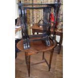 A nest of three Victorian occasional tables, with papier maché tops, having painted and gilt