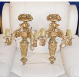 A pair of carved giltwood two light wall sconces, 50 cm high (2)