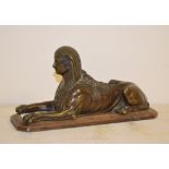 A bronze model of the Sphinx, 26 cm wide