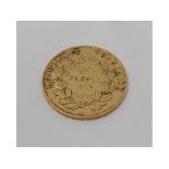 A French gold 20 Franc coin, 1852