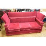 A Knole red velvet three seater settee