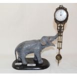 A painted metal mystery style timepiece, in the form of an elephant, 27 cm high