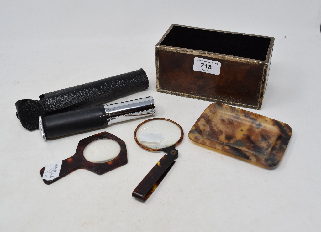 A silver coloured metal mounted burr wood box, 16 cm wide, a tortoiseshell magnifying glass, and