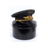 A German Luftwaffe General's cap, Erel maker's stamp to the sweatband, and a tin box See inside