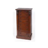 A Victorian mahogany Wellington chest, having seven graduated long drawers, on a plinth base, 51