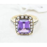 A 9ct gold, emerald cut, amethyst and seed pearl type ring, approx. ring size N½ Report by NG Modern