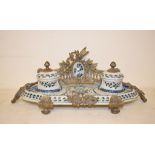 A Continental pottery inkstand, decorated flowers with brass mounts, 32 cm wide, other ceramics