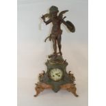 A French mantel clock, applied Cupid, 59.5 cm high, and another (2)