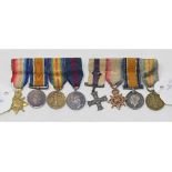 A set of miniatures, comprising a 1914-15 Star and a Military Cross, and another group of four