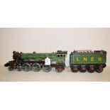 A painted metal model locomotive and tender, Flying Scotsman, 14 cm high, and a similar fire