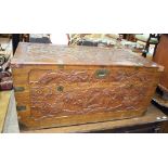 A Chinese carved camphorwood chest, 98 cm wide