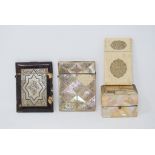A tortoiseshell and mother of pearl card case, 10.5 cm high, another mother of pearl card case, a