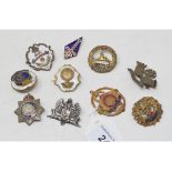 Ten sweetheart and enamel badges, including SWB, RWF and Hampshire Regiment