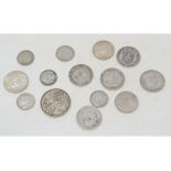 A George I shilling, 1723, a crown, 1889, and other assorted coins