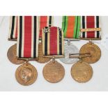 Six Special Constabulary Medals, and another mounted with a Defence Medal Report by GH Names as
