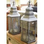 A pair of painted metal hexagonal lanterns, 78 cm high