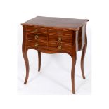 A Regency mahogany work table, crossbanded in rosewood and with boxwood and ebony stringing, of