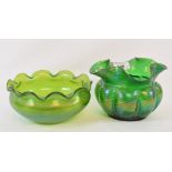 An iridescent green glass bowl, of shaped form, 16 cm wide and another similar (2)