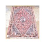 A Shiraz rug, 226 x 154 cm