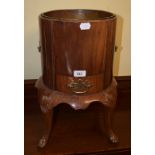 A mahogany bin, with a small drawer, on pad feet, 47 cm high