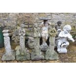A set of four reconstituted stone garden statues, one lacking it's figure, and other reconstituted