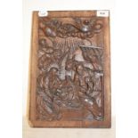 An oak panel, carved the Nativity scene, 37.5 x 25 cm