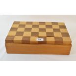 A chess set, the two piece box lid forming the chess board, 37 cm wide