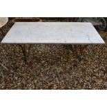 A marble topped rectangular garden table, on wrought iron and lead supports, 102 cm wide
